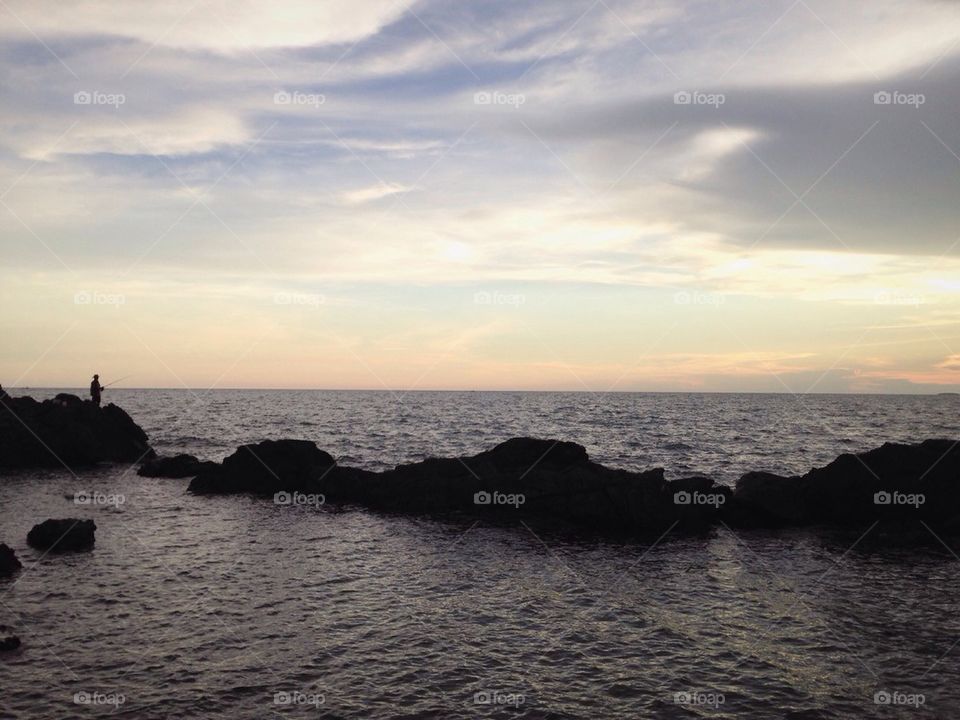 Fishing on the cliff