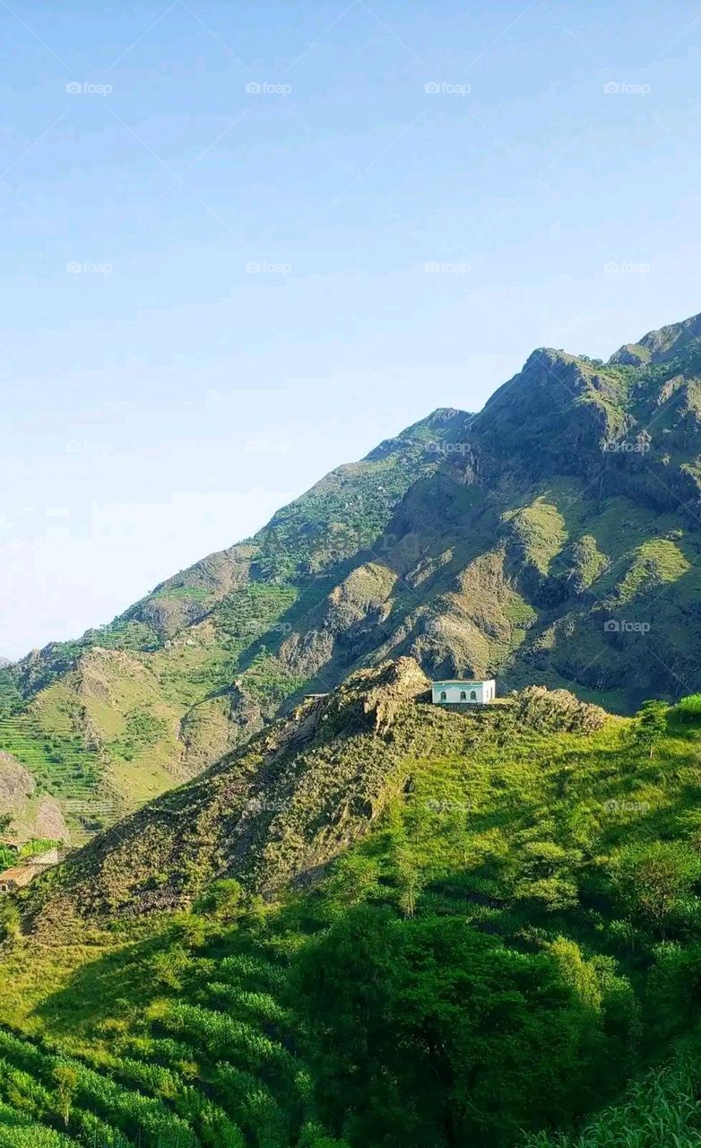 Glory be to God, the magnificent and picturesque view and the natural green trees are a view that is nothing more wonderful than it