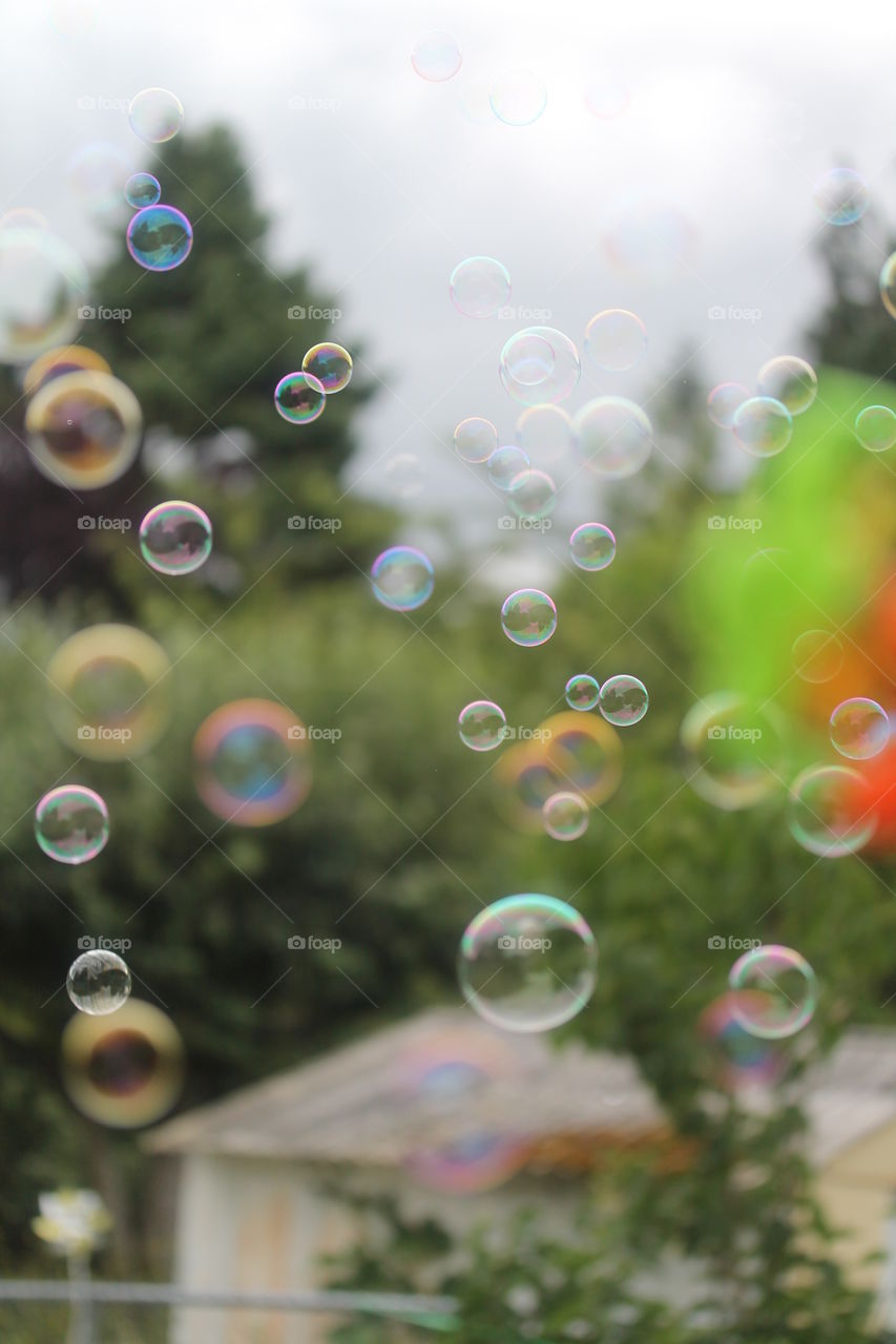View of colorful bubbles from window