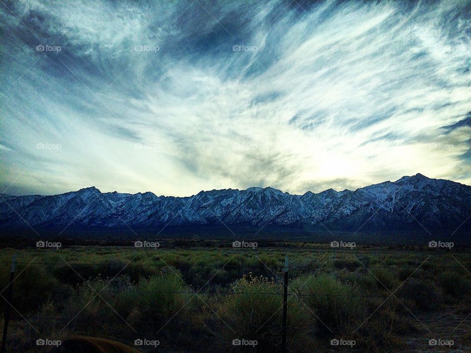 Mountain range with cloudy sky