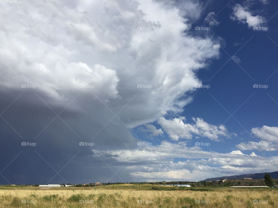 Half Stormy Half Sunny. A thunderstorm moving in