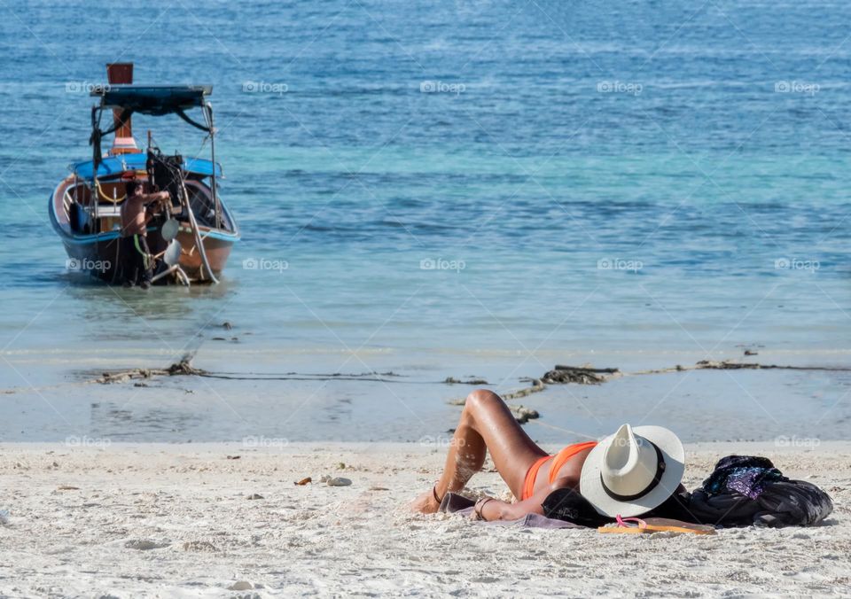 Happy hour to sunbath on the beautiful beach