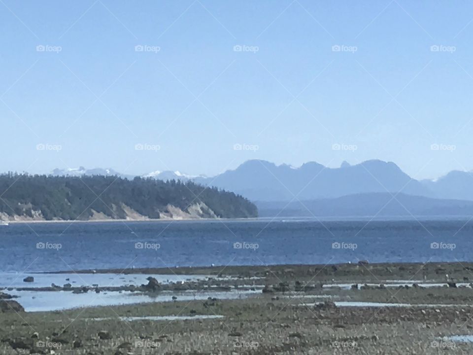 Beautiful view of the mountains on the mainland from Vancouver Island across the Georgia Strait