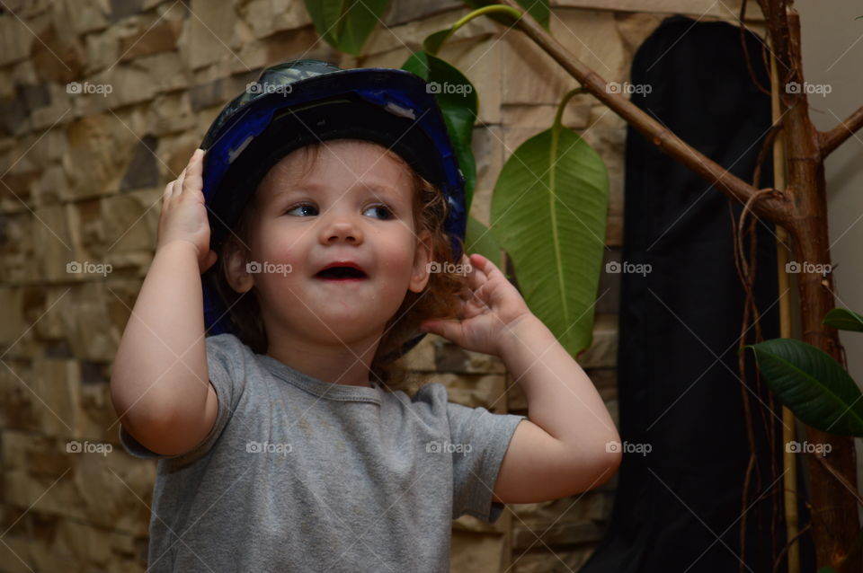 Child in a unique helmet