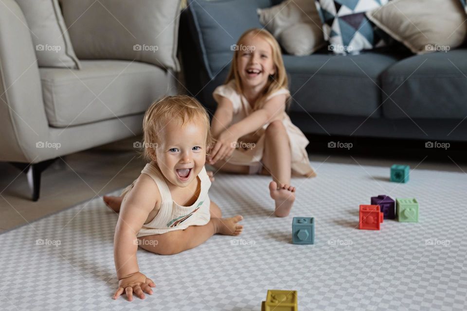 Cute Caucasian siblings having fun 