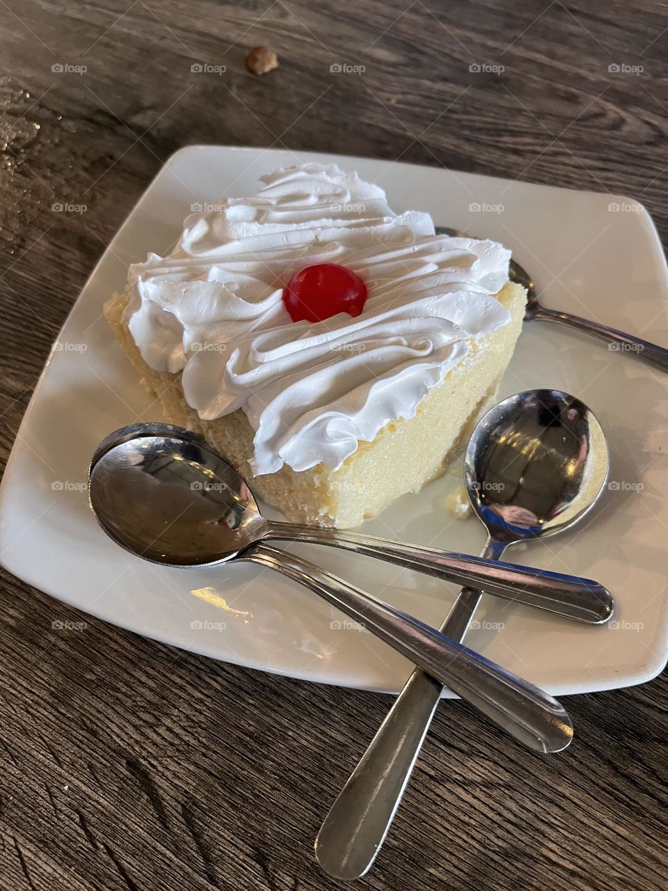 Beautifully made moist Tres Leches cake served to share!