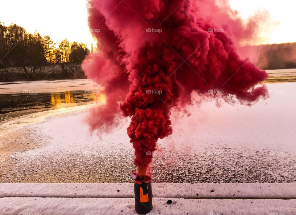 Red smoke outdoors