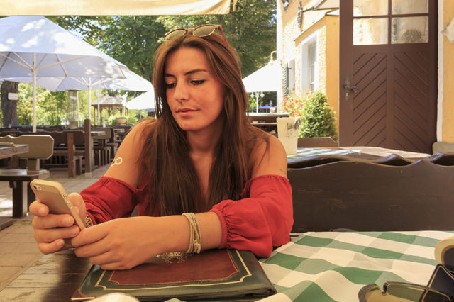 Girl busy with the phone