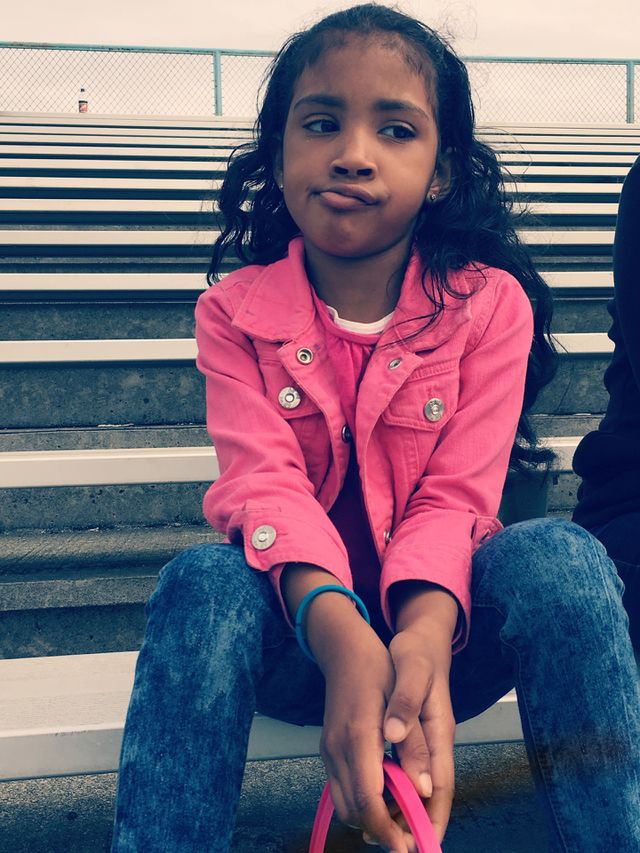 Small sitting on steps