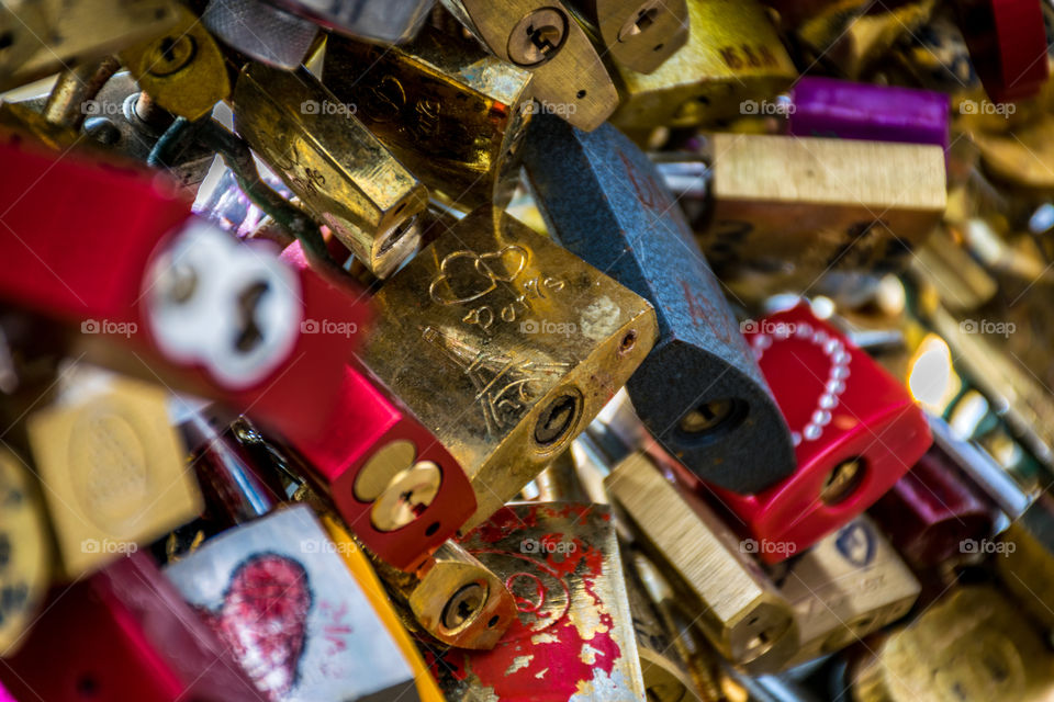 love locks. close up of the padlock laden Pont Des Arts bridge in Paris.