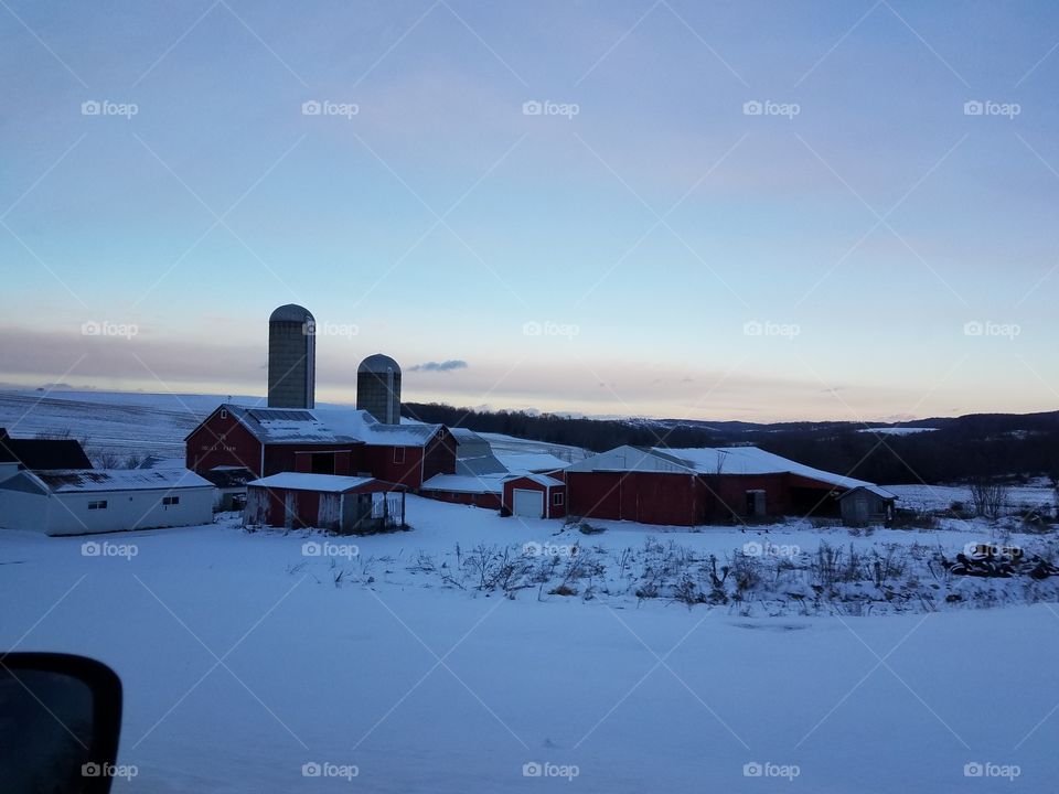 silos in the setting sun