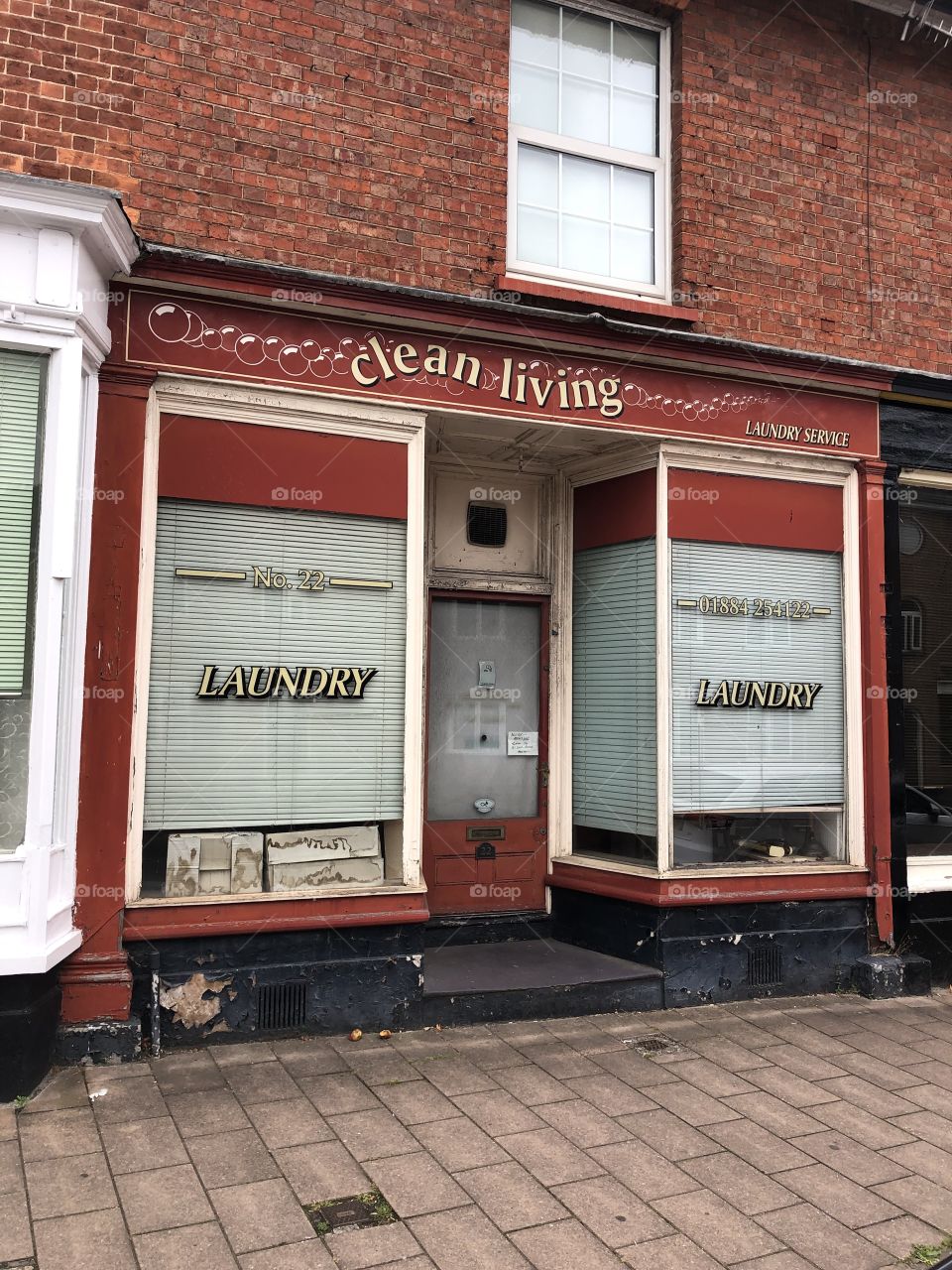 This laundry mat had an unfortunate name “Clean Living” now abandoned this property lies derelict and neglected, a far cry from that fascia slogan.