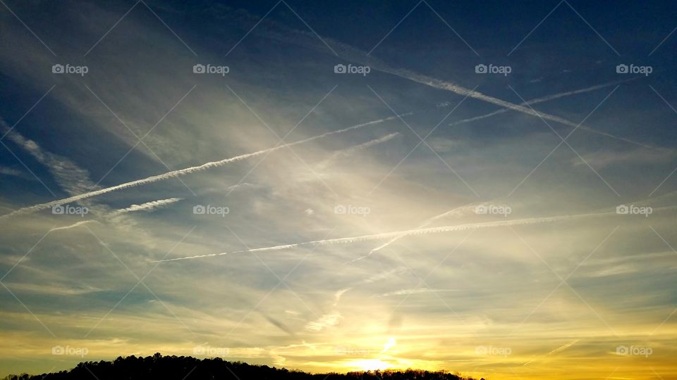 dusk with sky full of lines.