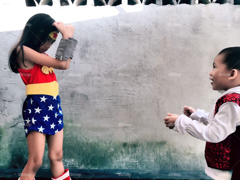 Kids wearing halloween costume