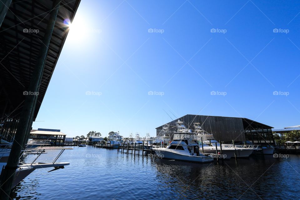 Parking dock with clear blue sky