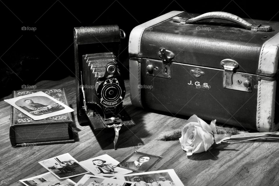 Still life of old camera and old photos 