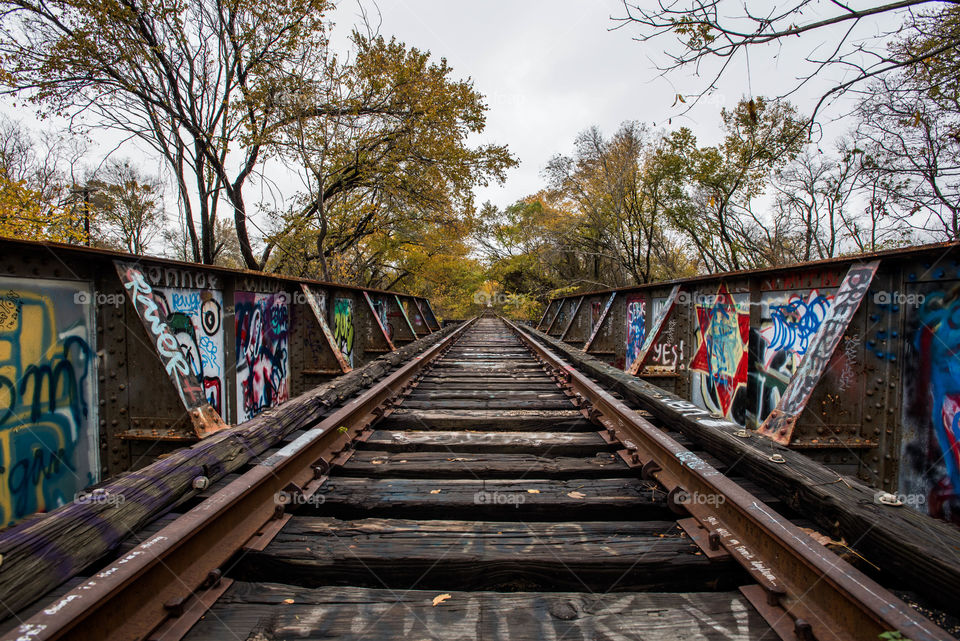 grafitti covered abandoned train tracks