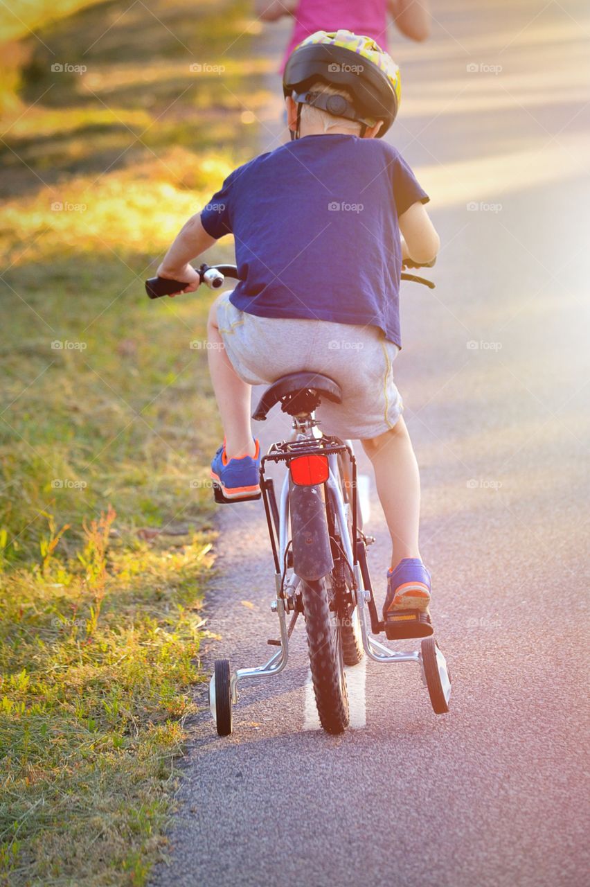 Boy bicycling