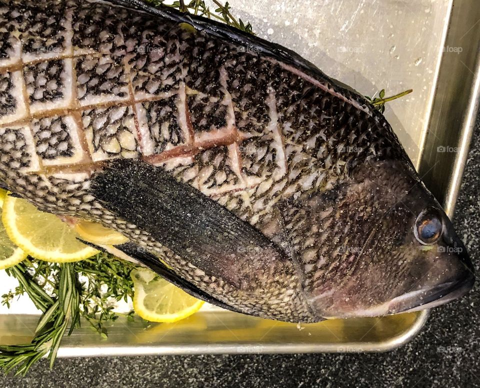 A Fish Prepared And Awaiting The Grill