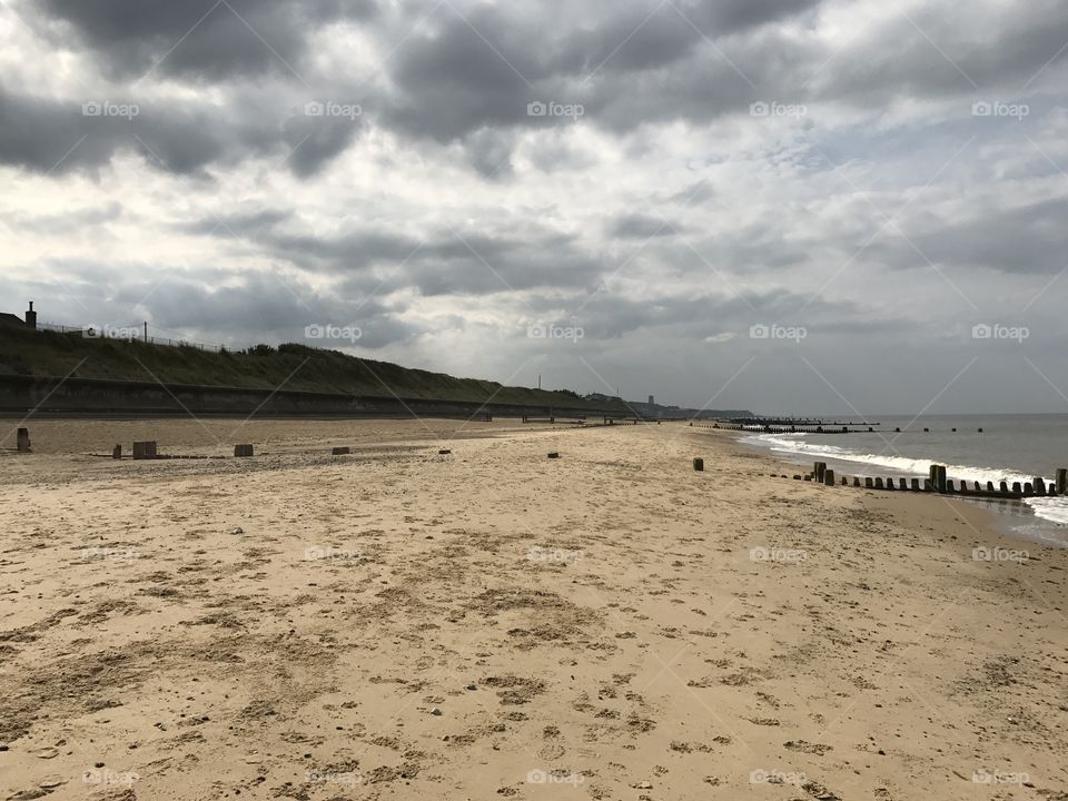 Rain clouds over Norfolk beach