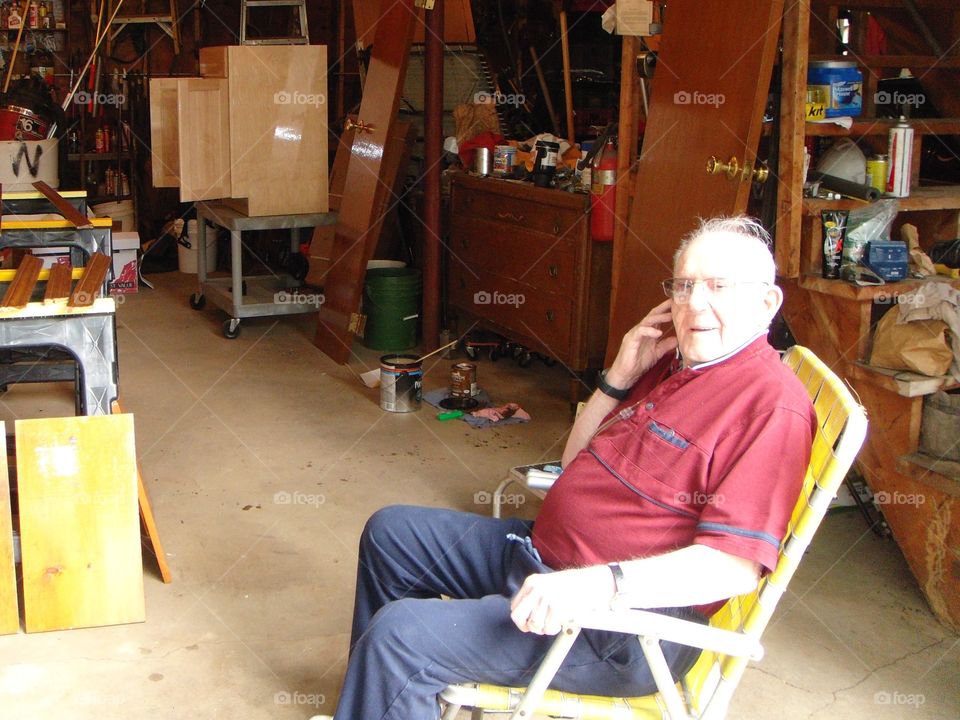 Senior man sitting on chair