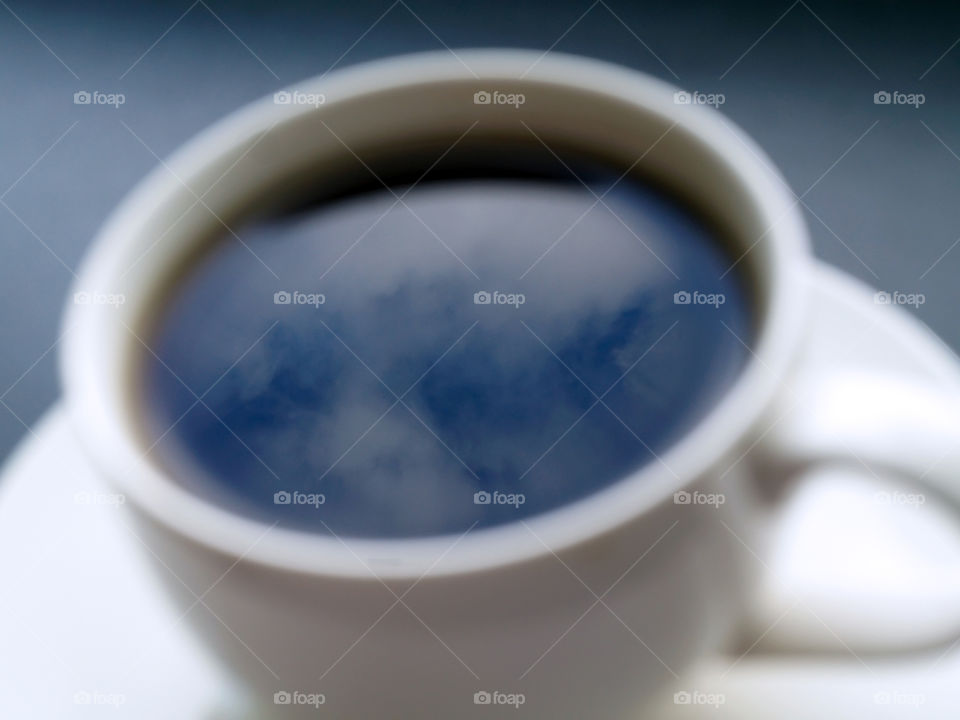 Sky in the cup of tea. Close up. Selective focus