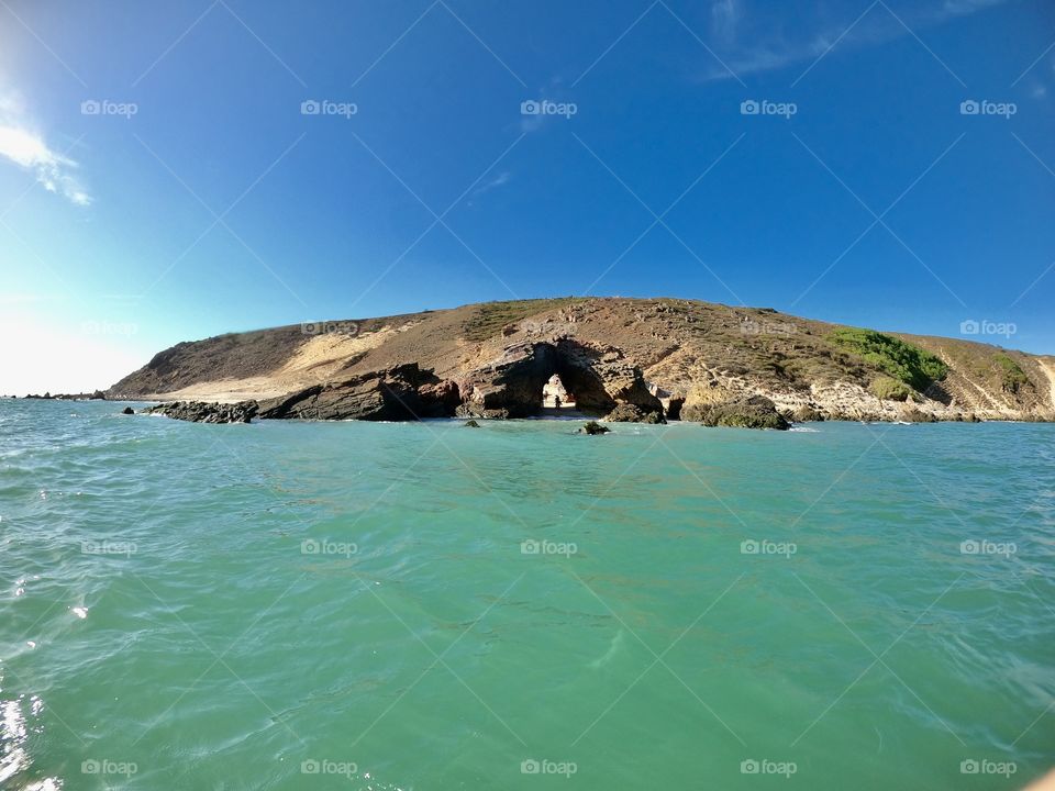 Magical stone with hole from seaside 