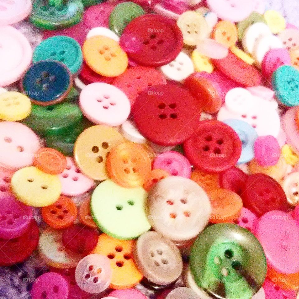 dive Right in to these amazing and colorful buttons as your creativity is sparked and you create a beautiful piece of art.