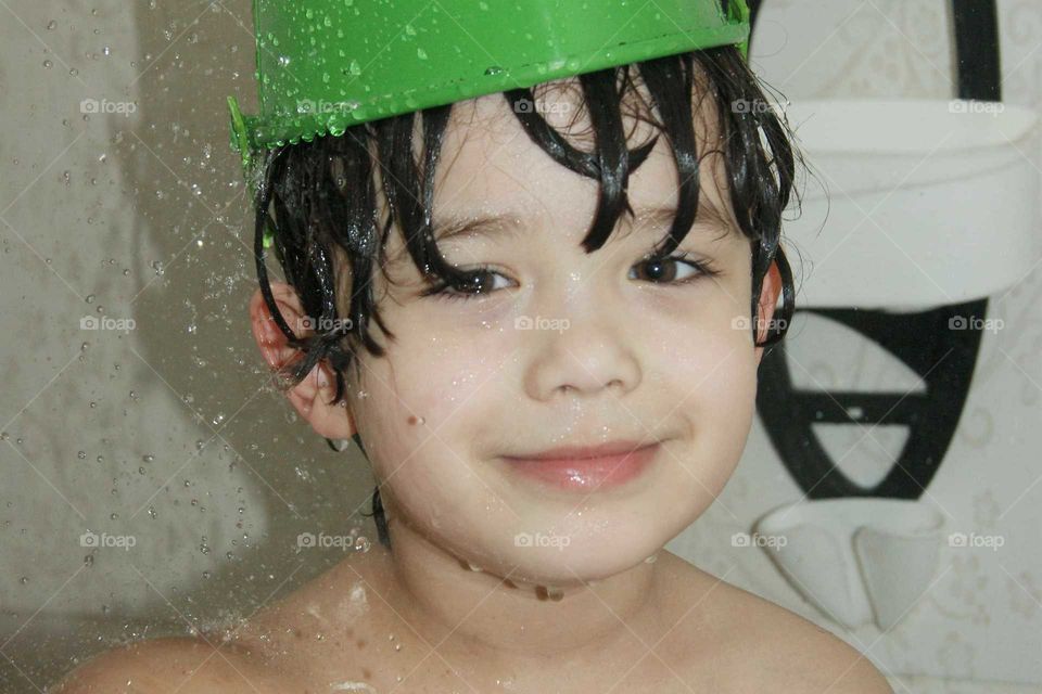 child playing in the shower