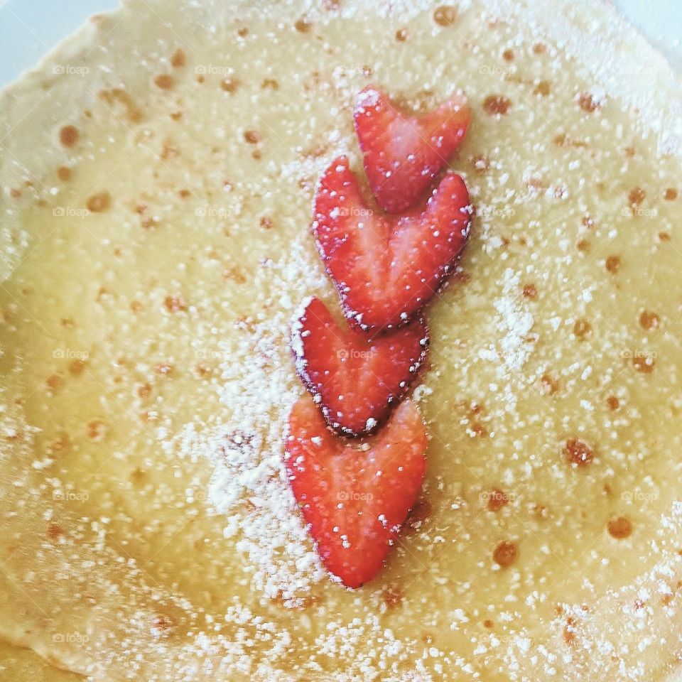 Homemade crepes with fresh strawberries makes for a delicious breakfast! 