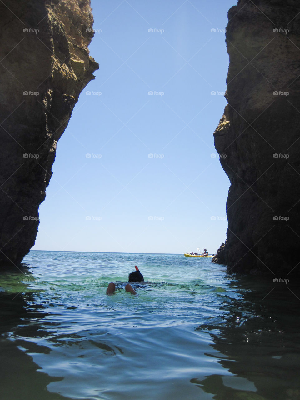 Person swimming in sea