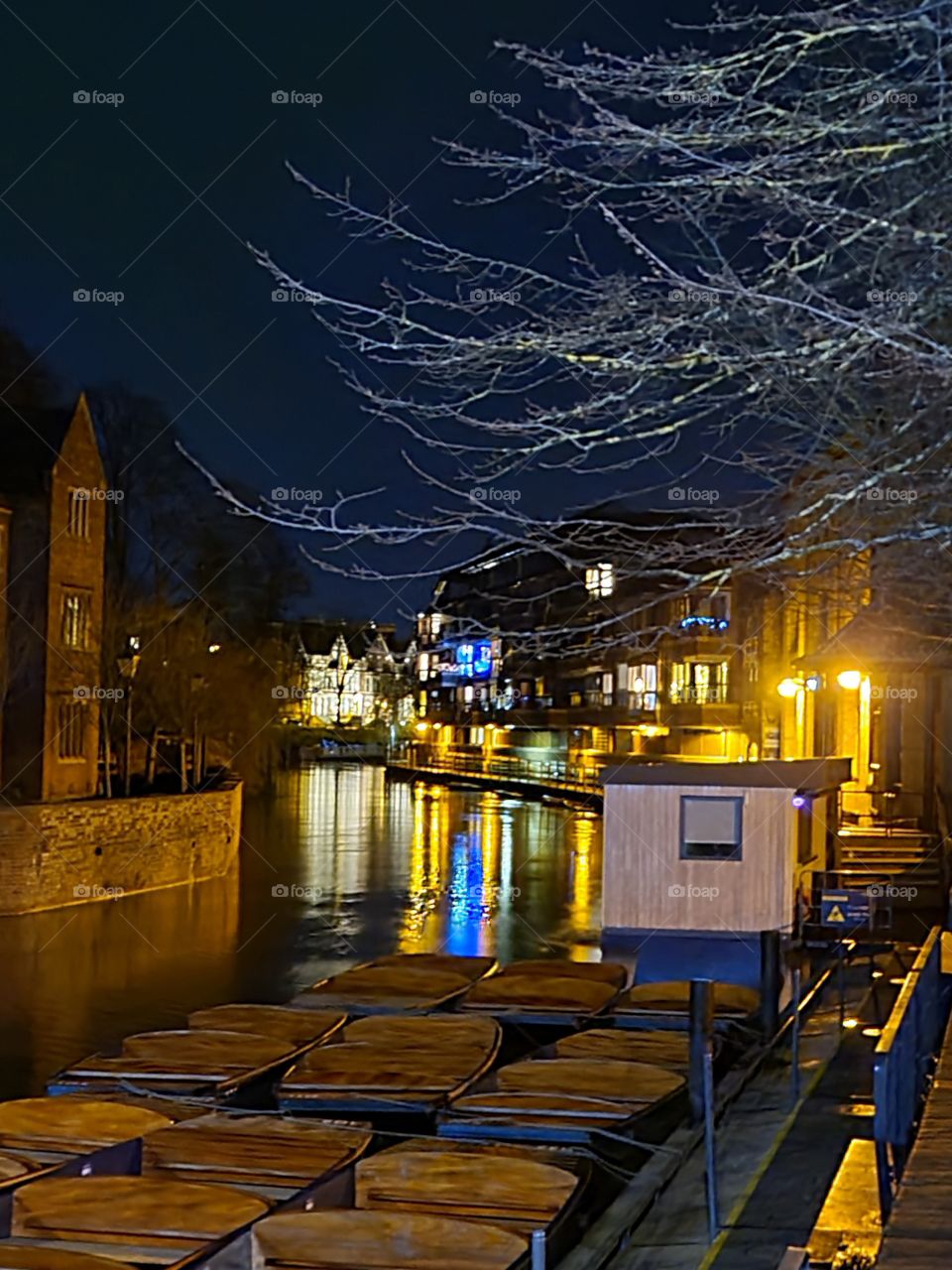 Romantic evening at Cambridge , by the river.