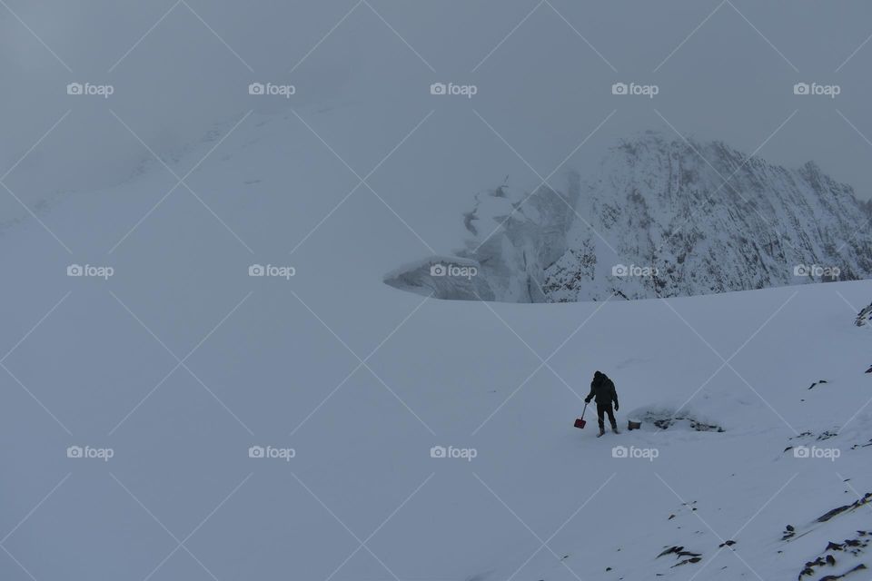 collecting snow for water