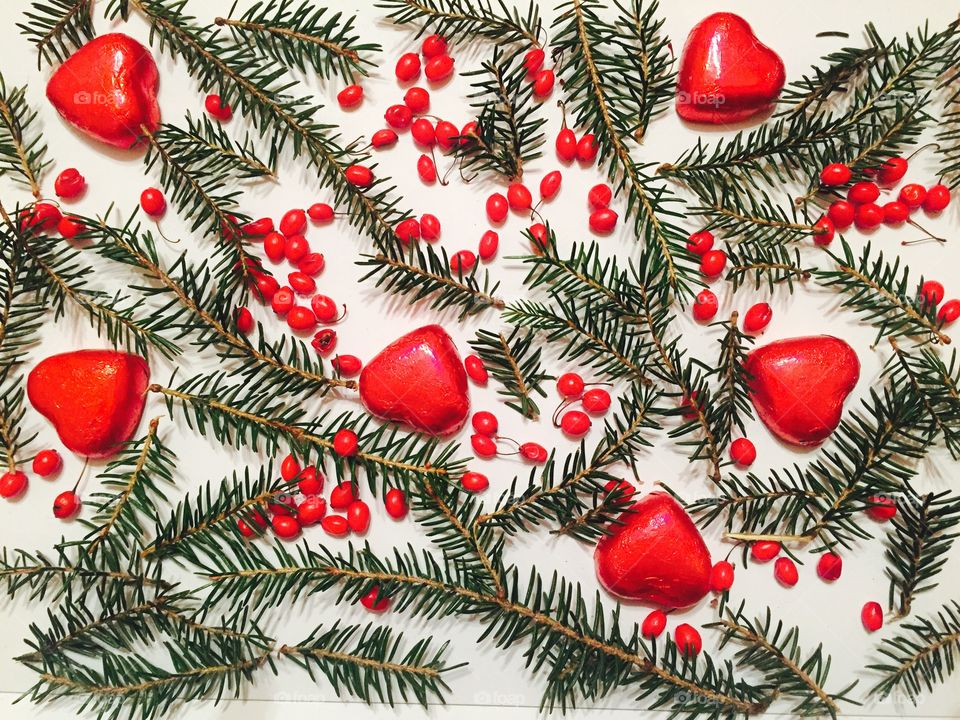 High angle view of heart shape chocolate with pine tree