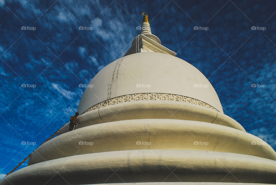 Church in Sri Lanka with blue sky behind 