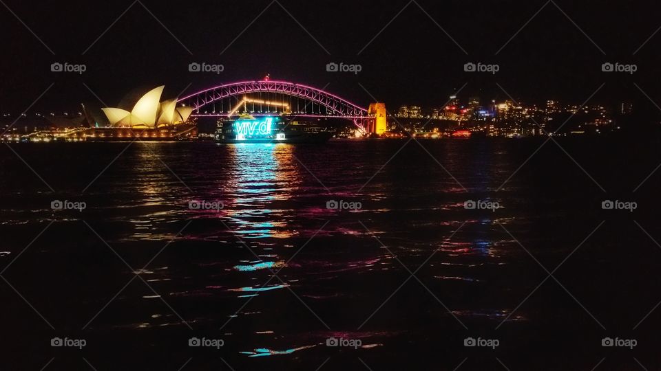May 30, 2016 - The Vivid Sydney event evening. Image captured in the Sydney Harbor foreshore, with The Opera House and Harbor Bridge as center of attention.