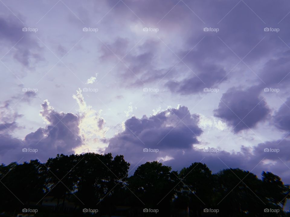 Sun shining through the clouds