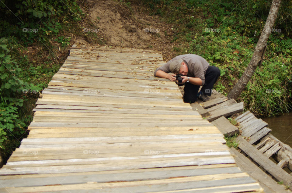 Male photographer taking pictures