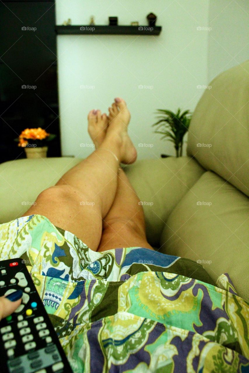 Woman relaxing on sofa