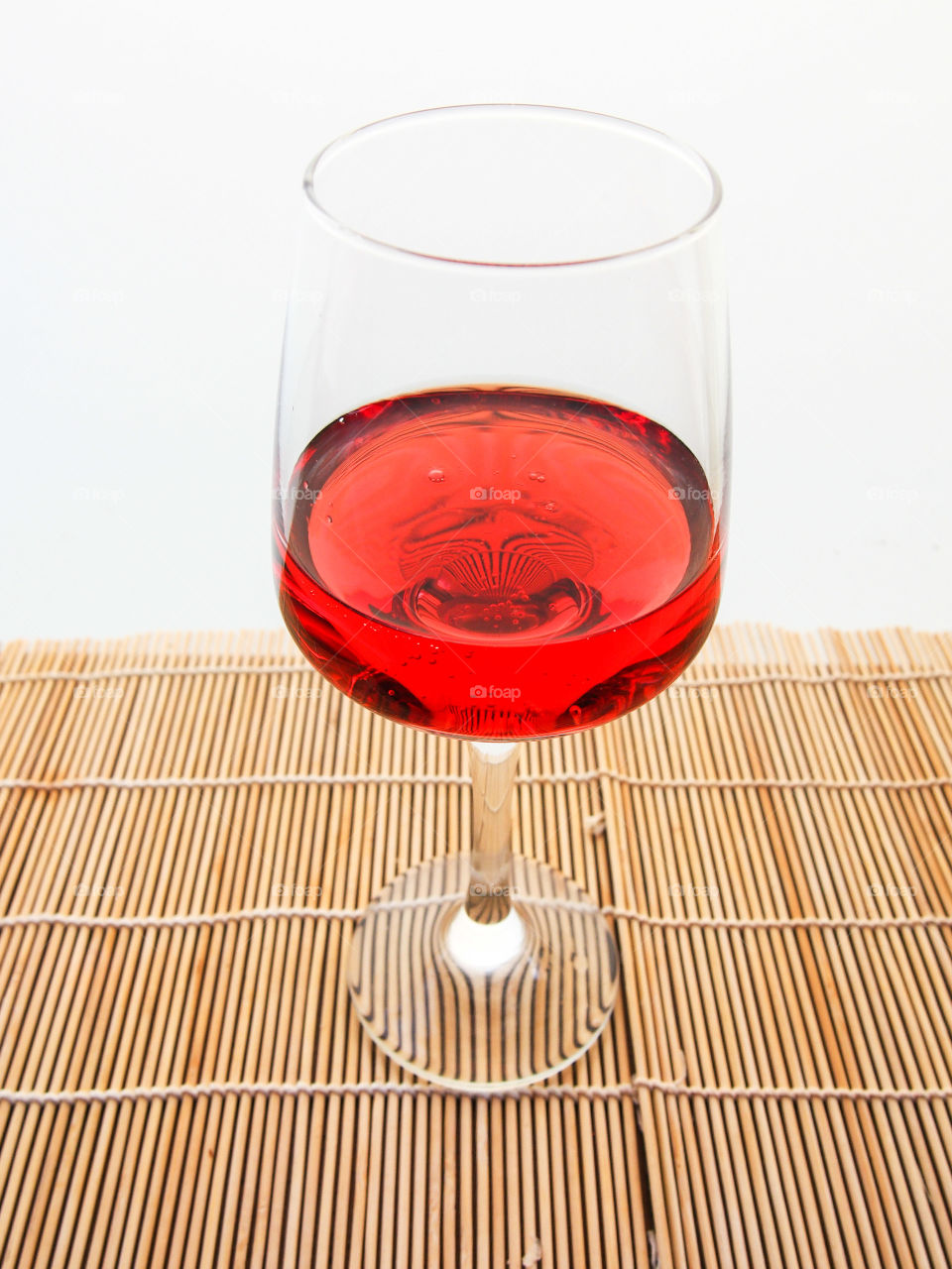 Red wine in glass on table
