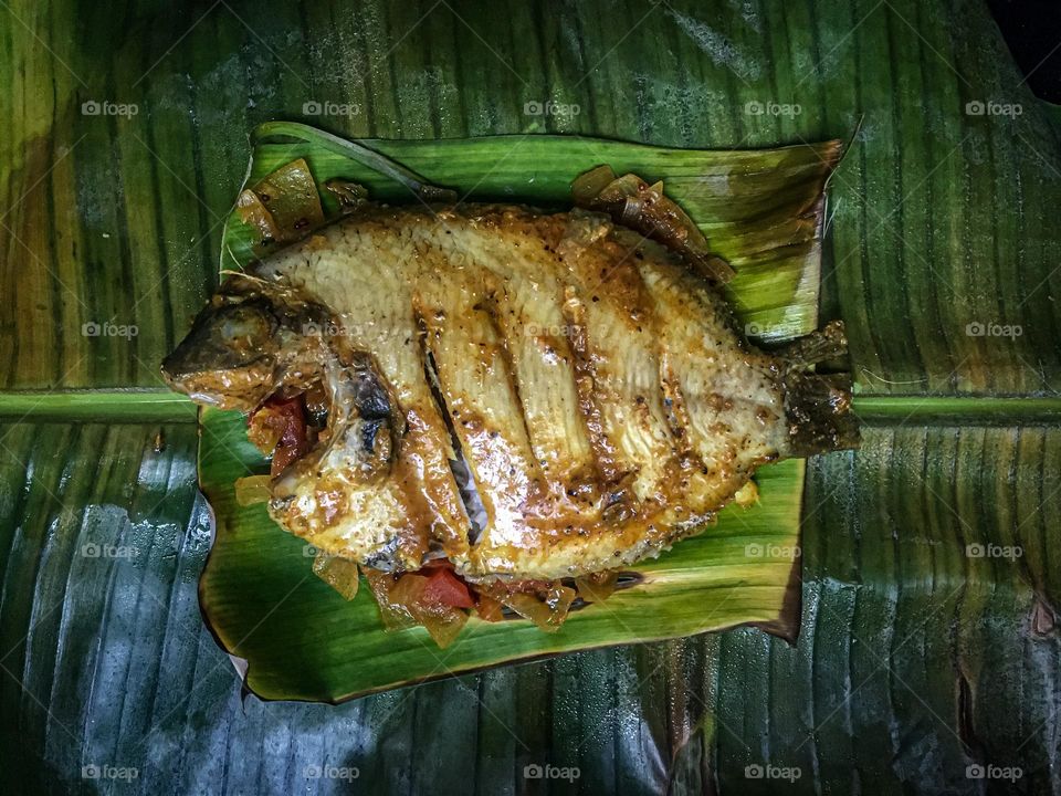 Kerala style fish curry, wrapped in the banana leaf