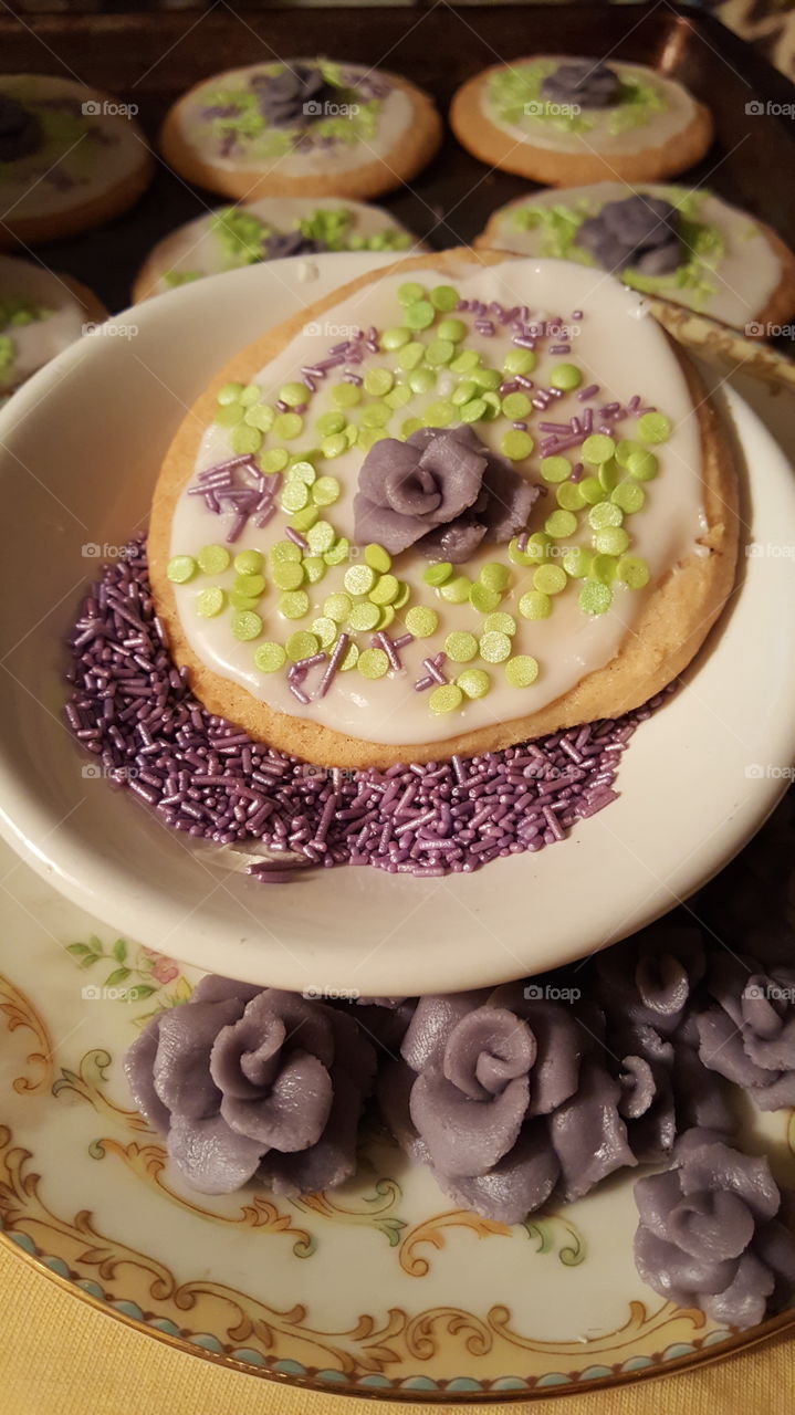 Almond glazed sugar cookies, with Wilton decorative sprinkles, and topped with a hand made modeling chocolate rose. These cookies were the talk of the charity bake sale, which was held to benefit Boston's mens homeless shelter - The Pine Street Inn.