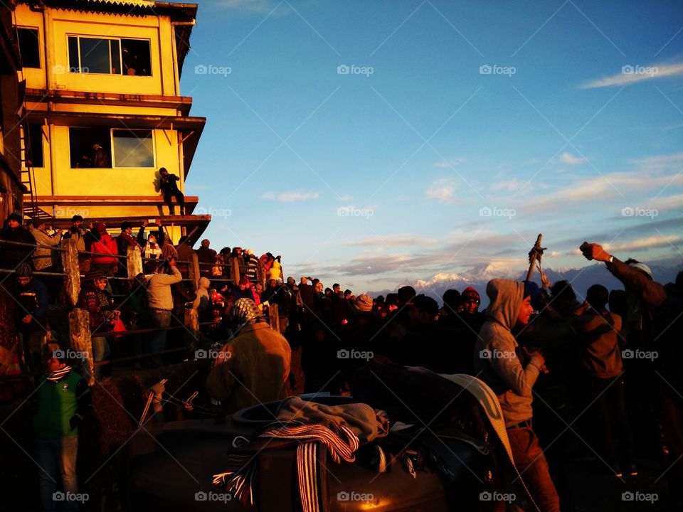 People have gathered to see sunrise from the top of the mountain... Darjeeling ..India...
