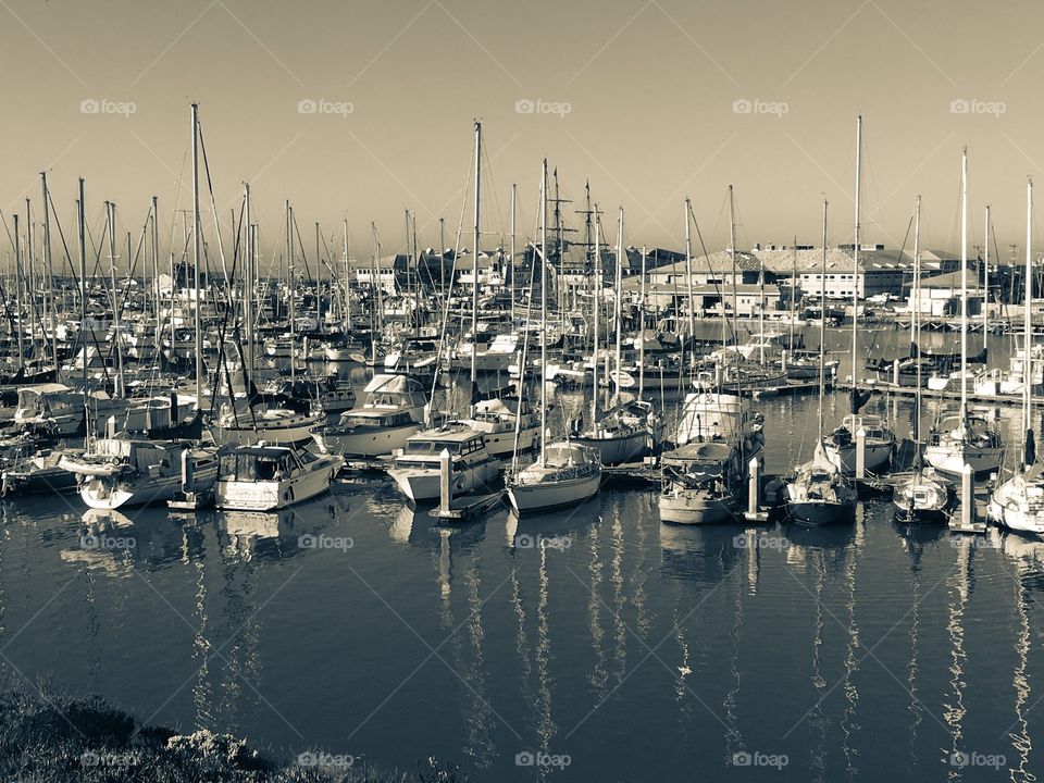 Many boats and sailboats in marina in California 