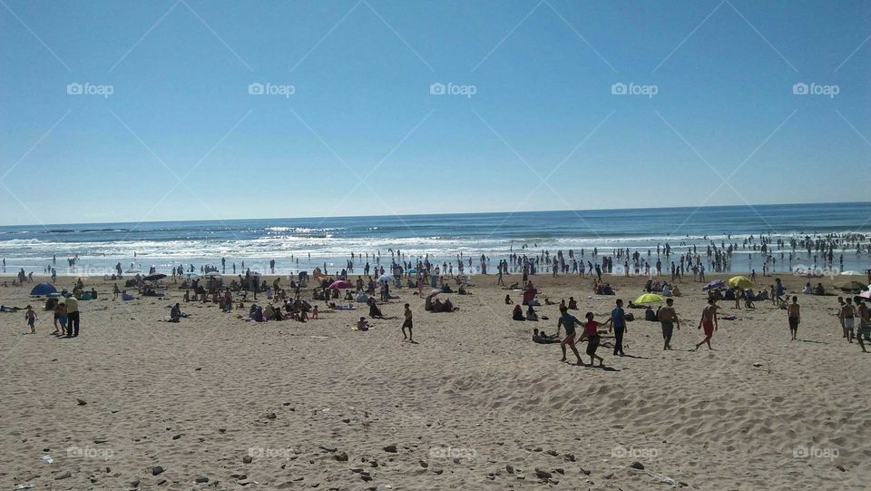 Crowd of people near the beach