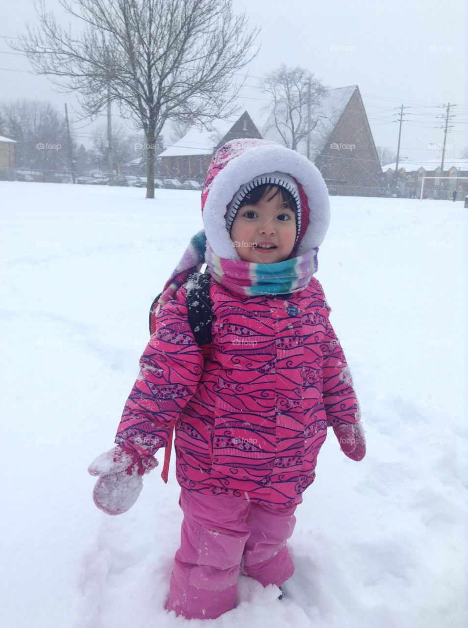 Girl standing in snowy land