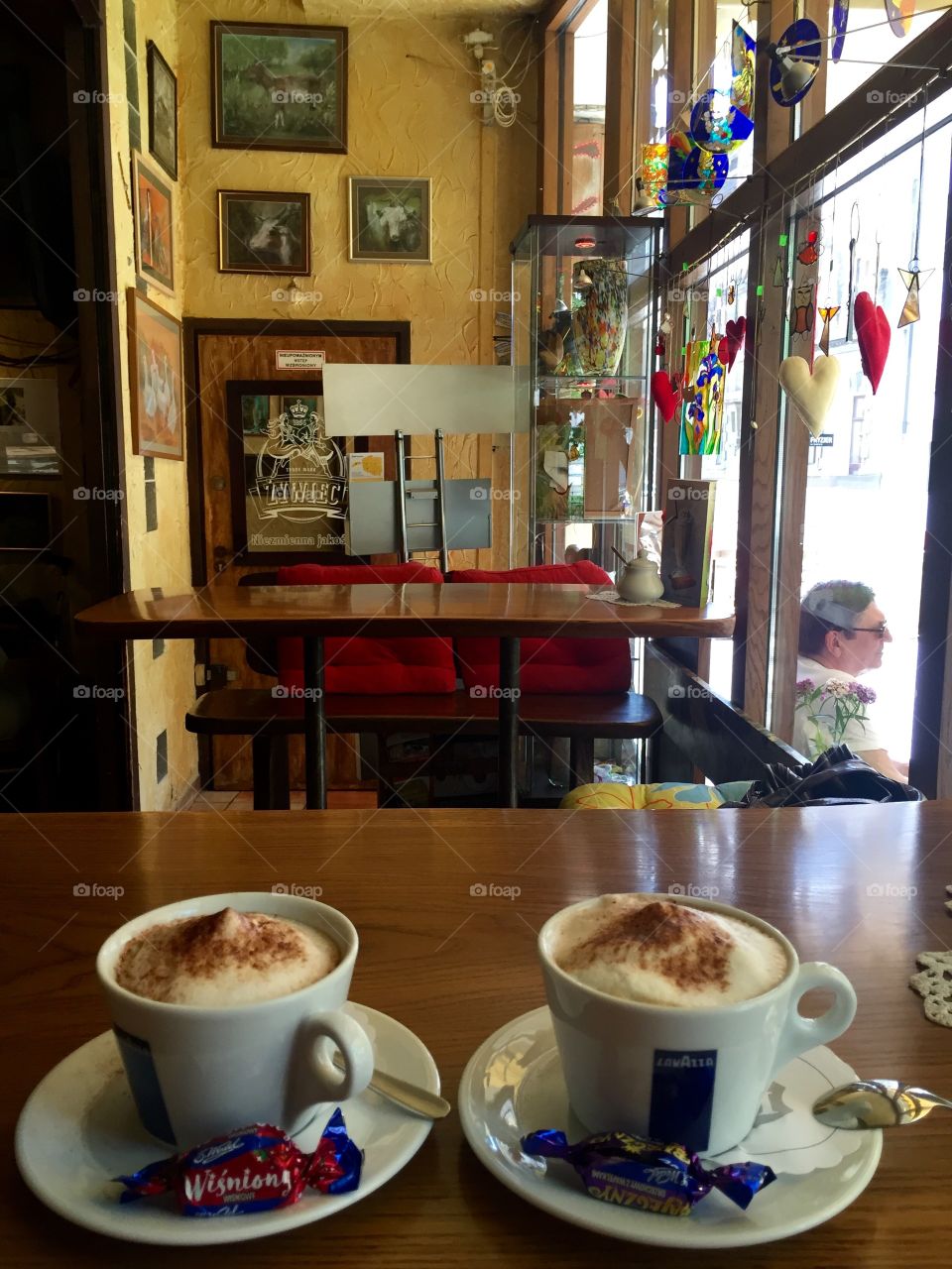 Two cups of coffee on the table in an art coffeeshop 