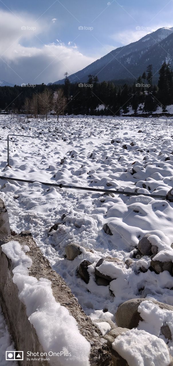 A river in Manali got frozen like clouds on the earth .. Beautiful landscape of snow shows the heaven on earth