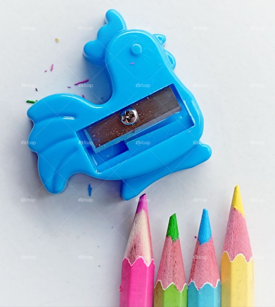 sharpened colour pencils and sharpener...