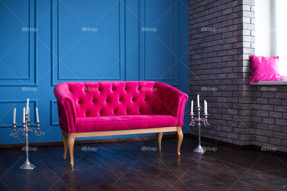 Empty pink sofa at indoors